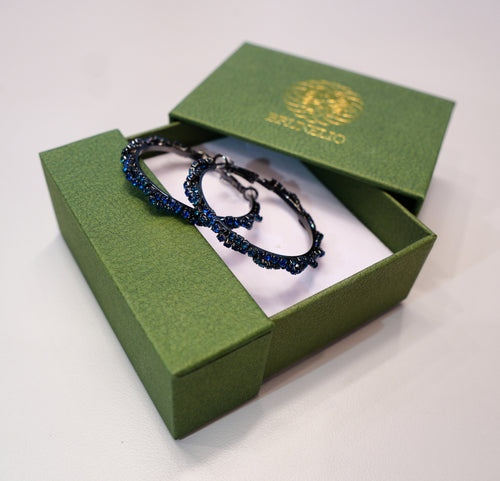 Black earrings with blue diamonds