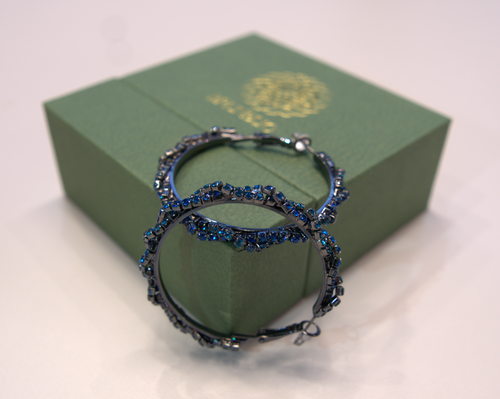 Black earrings with blue diamonds